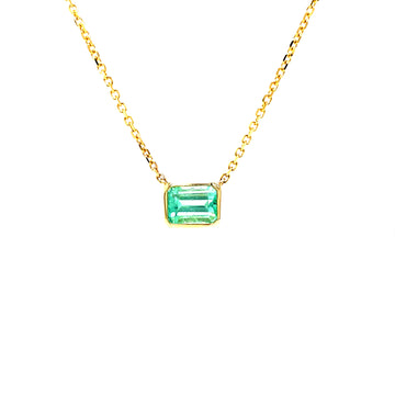 Emerald-cut green gemstone pendant in 14k yellow gold with link chain