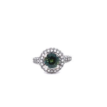 Platinum sapphire and diamond halo ring with round green center stone