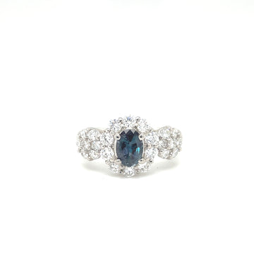 Platinum oval alexandrite ring with diamond cluster halo