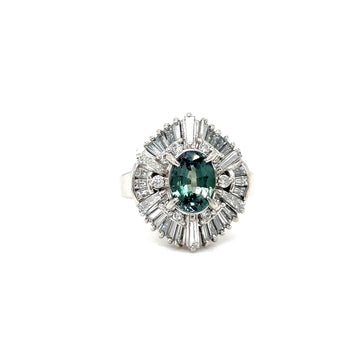 Platinum alexandrite and diamond ring, round teal gemstone with diamond halo band.