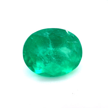 Green oval emerald gemstone, smooth polished cabochon