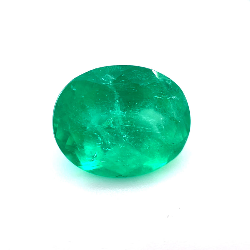Green oval emerald gemstone, smooth polished cabochon