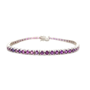Purple sapphire tennis bracelet with oval bezel-set gemstones and clasp