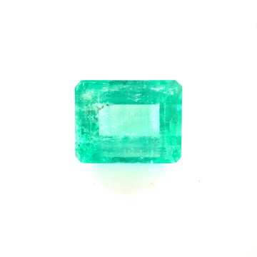 Rectangular emerald-cut green emerald gemstone, bright facets