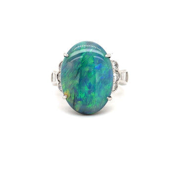 Platinum opal and diamond ring with large oval green opal center
