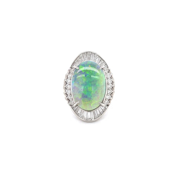 Oval opal and diamond halo ring in platinum with an oval center stone.