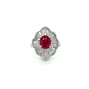 Platinum ring with round red ruby center and diamond halo