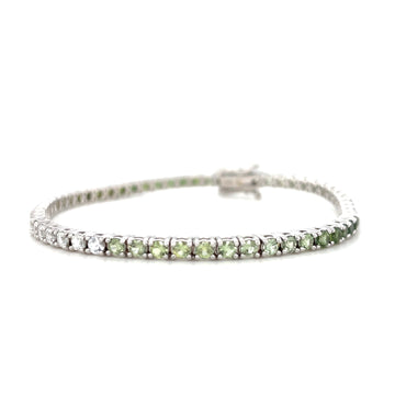 White gold tennis bracelet with green ombre round sapphires and small clear stones
