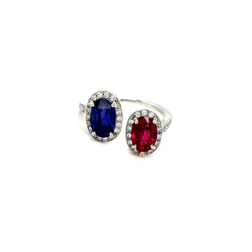 Platinum toi et moi ring with blue oval sapphire and red oval ruby in prongs