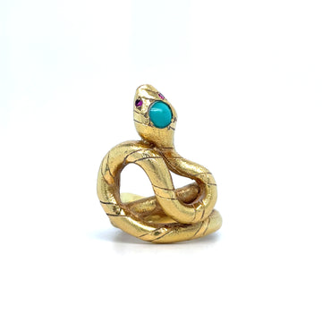 18k yellow gold snake ring with turquoise cabochon and small purple stones