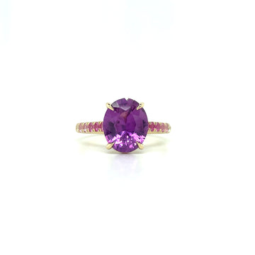 14k yellow gold ring with oval purple sapphire and pavé band