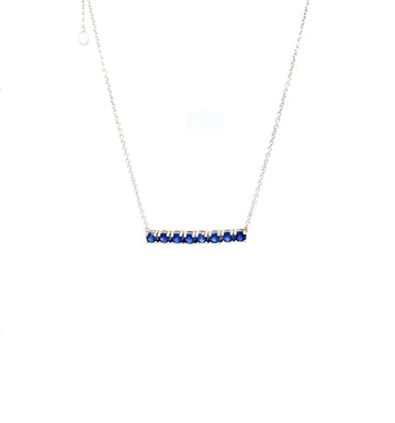 Blue sapphire bar pendant with row of stones on a silver chain