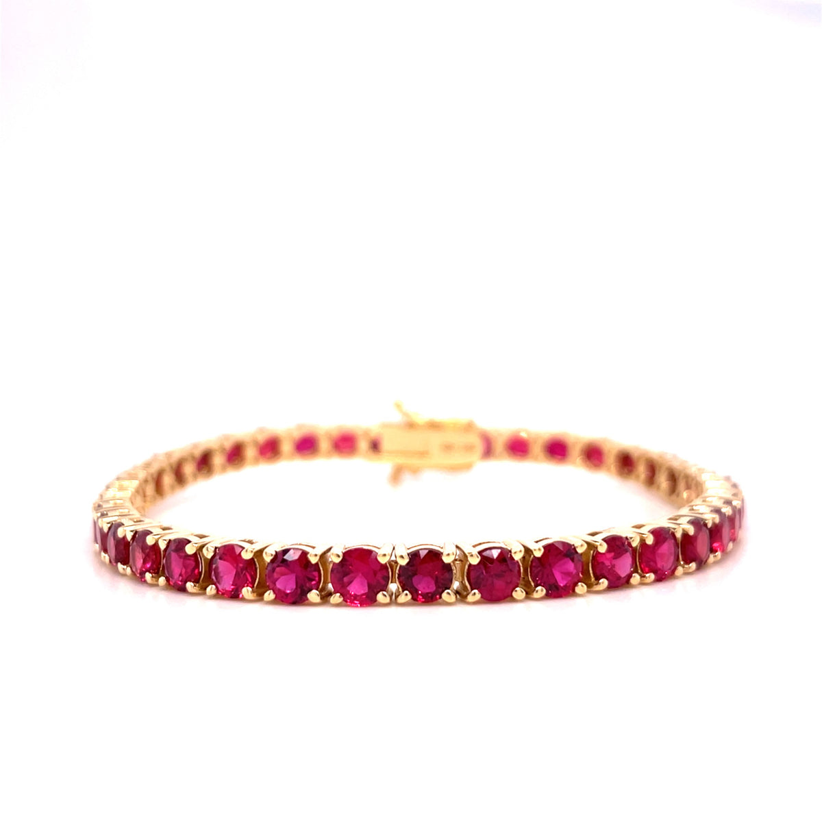 Ruby tennis bracelet with prong-set round red gemstones in gold-tone links