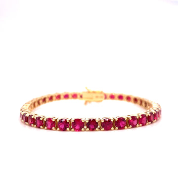 Ruby tennis bracelet with prong-set round red gemstones in gold-tone links