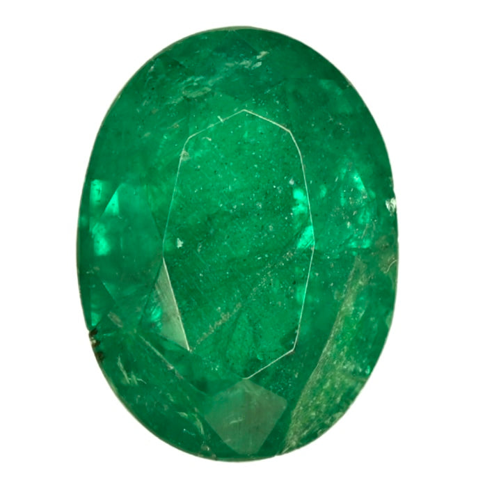 Oval green emerald-cut gemstone with faceted surface