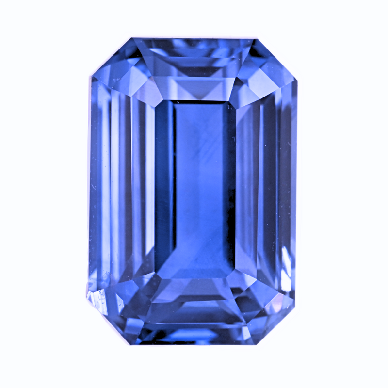 Emerald-cut blue sapphire gemstone, step-cut close-up