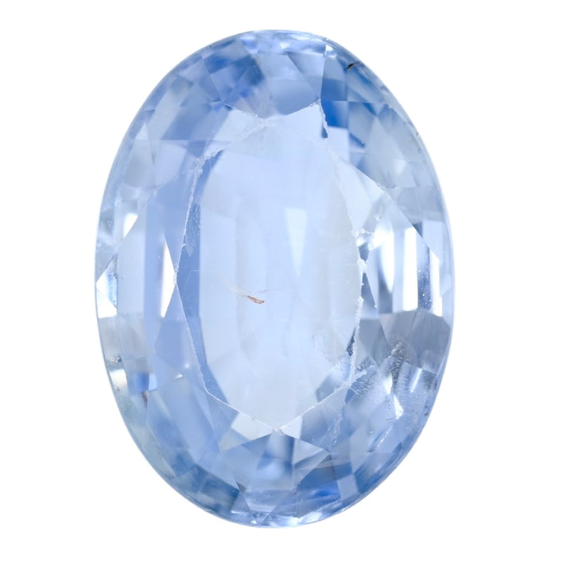 Oval blue sapphire gemstone with faceted cut and glossy sparkle