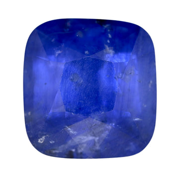 Cushion-cut blue sapphire gemstone, faceted with deep vivid blue tones