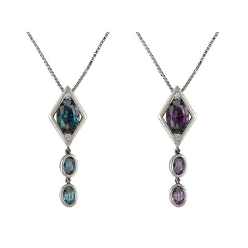 Platinum pendant necklace with geometric halo and blue/purple alexandrite-style drops, diamond chain