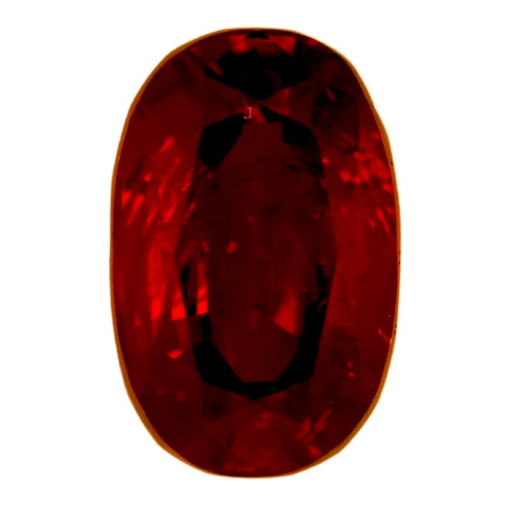 Oval dark red ruby gemstone close-up, faceted