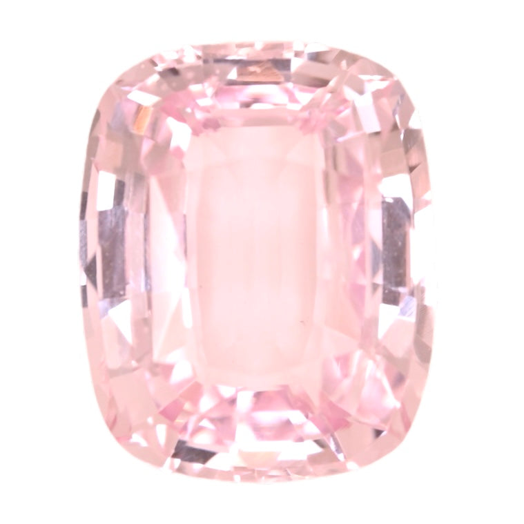 Cushion-cut pink sapphire gemstone, clear rose pink center with faceted edges