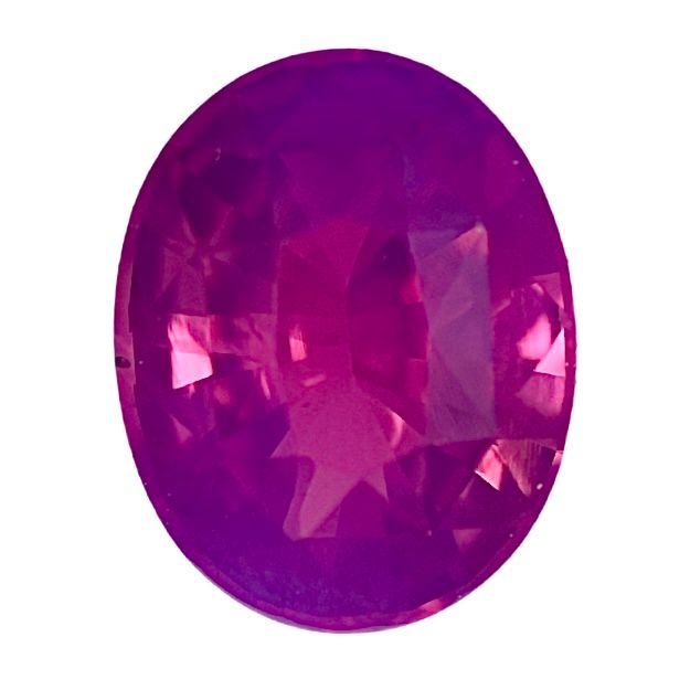 Oval faceted pink sapphire gemstone with vivid magenta tone