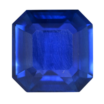 Octagonal blue sapphire gemstone, step-cut, deep blue