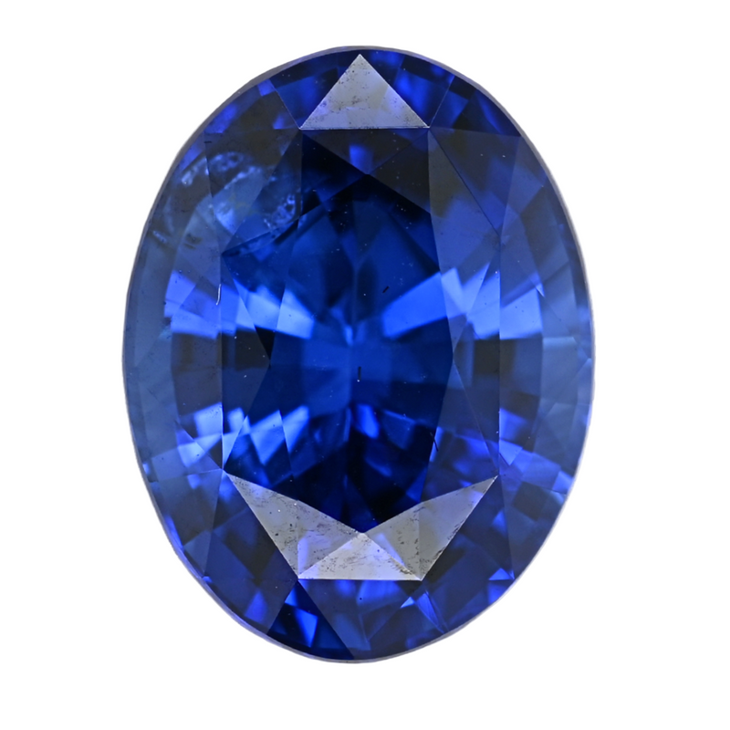 Faceted oval-cut blue sapphire gemstone, close-up of sparkle