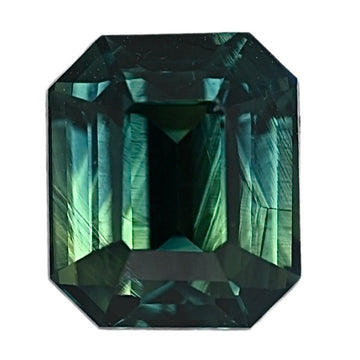 Teal sapphire gemstone, emerald-cut with faceted prism-style facets