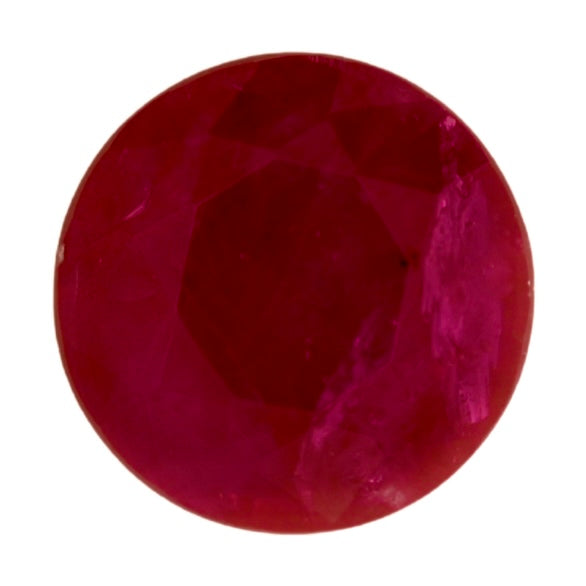 Round ruby gemstone, deep red faceted stone with glossy luster