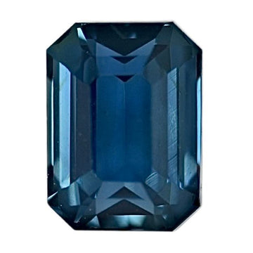 Octagonal step-cut teal sapphire gemstone, faceted teal blue stone