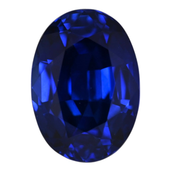 Oval blue sapphire gemstone, faceted deep navy-blue oval
