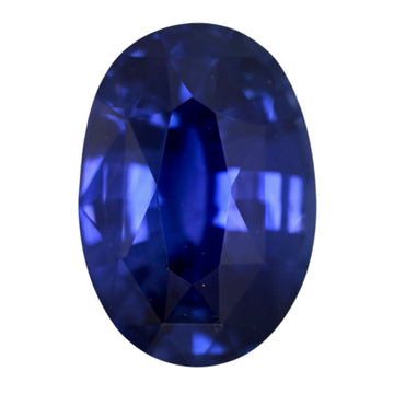 Oval blue sapphire gemstone with faceted surfaces
