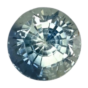 Oval teal sapphire gemstone with faceted cut and sparkling highlights