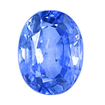 Blue sapphire cushion-cut gemstone close-up, large faceted surface