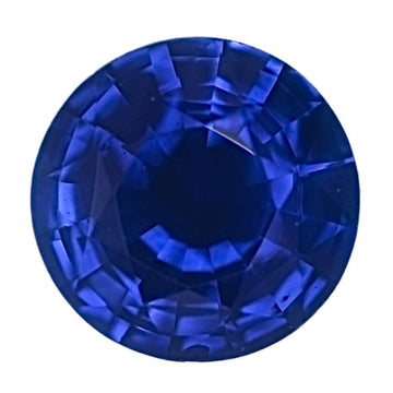 Round blue sapphire gemstone, faceted, vivid deep blue