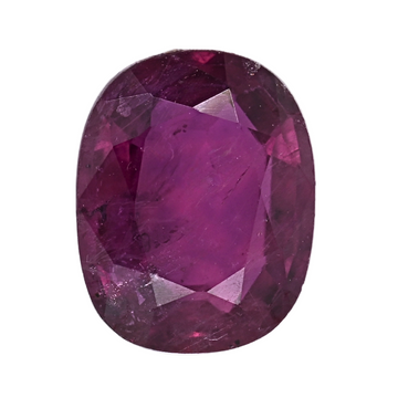Oval faceted ruby gemstone close-up, vibrant deep pink-red facets