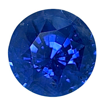 Round blue sapphire gemstone with faceted cut