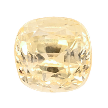 Yellow cushion-cut sapphire gemstone with faceted oval shape