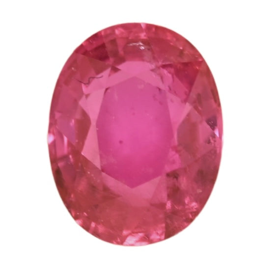 Oval ruby gemstone, pink-red faceted stone