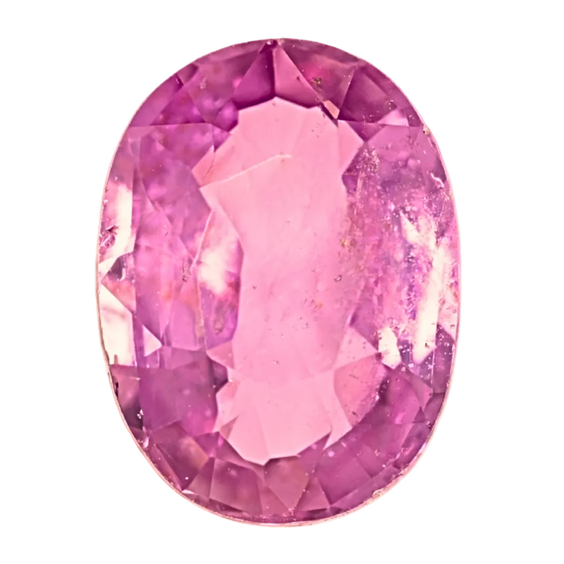 Oval pink sapphire gemstone with faceted cut