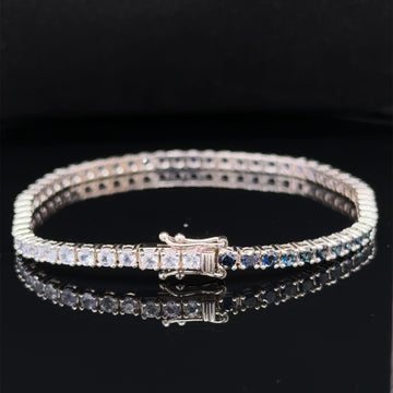 Ombré sapphire tennis bracelet in white gold with round stones and box clasp